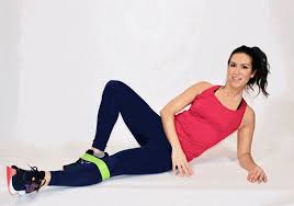 Put your feet through the loop of a flat band and pull it up your legs to just above your. A One Month Resistance Band Workout You Can Do Anywhere