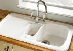 Comment Nettoyer Un Evier En Resine Tout Pratique Evier En Resine Evier En Granit Evier Blanc