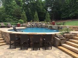 Brighten up your cascading tiered fountain with colorful blossoms along its edge. 100 Lakefront Landscaping Ideas Backyard Backyard Landscaping Backyard Patio