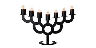 Bold Moooi Menorahs hold a very special arrangement of nine menorah candles. bold