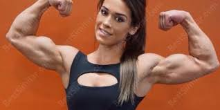 Perfect fitness muscle woman flexing her beautiful strong ripped biceps. Female Bodybuilder Movies Best And New Films