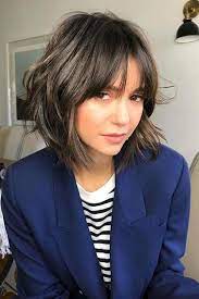 Short Shag Haircuts That Ll Finally Convince You To Make The Chop Short Shag Haircuts Modern Shag Haircut Short Hair With Bangs