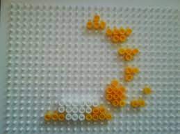 Previously beads had been glued, either onto plastic trays or pieces of cardboard. Hama Bead Bubble Bobble Bob D How To Make A Pegboard Bead Charm Pegboard On Cut Out Keep