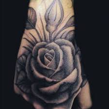 One might think that a rose tattoo will entail a flower embedded into the tissue of your skin. Tattoo Uploaded By Katie Rose Hand Tattoos Rose Hand 144120 Tattoodo