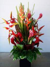 We use these pools of inspiration to construct our own unique graphic language and apply it in a way that tells a story. Pin By Matildolina On Flowers Cakes Tropical Floral Arrangements Tropical Flower Arrangements Tropical Flowers