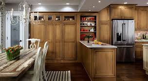 Kitchen Remodel With Tall Cabinets And Cabinet Peninsula In A Maple Coriander Cabinet Finish With A Coffe Kitchen Remodel Small Kitchen Remodel Decora Cabinets