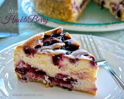 White Chocolate Huckleberry Cheesecake With White Chocolate Amaretto Liqueurs Wildflour S Cottage Kitchen Recipe Huckleberry Recipes Huckleberry Cheesecake Huckleberry Desserts