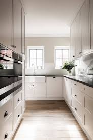The light fixture is from nessen lighting. 75 Beautiful Kitchen With Black Benchtop Ideas Designs August 2021 Houzz Au