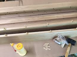 To prepare the plywood, you will need to sand the surface to remove any dirt, debris, and loose particles. The Project Lady How To Build A Farmhouse Table Post 4 Gluing Table Top Together With Dowels