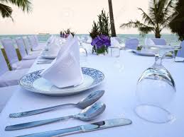 Upload, livestream, and create your own videos, all in hd. The Set Of White Table And Chairs For Private Dinner Party On The Beach Including Napkins Knifes Spoons Glasses And Waiting For The Sunset Time Romantic Time Stock Photo Picture And Royalty