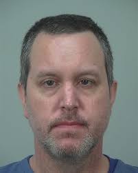 Man robbed at gunpoint in Janesville, 1 suspect arrested, another at large