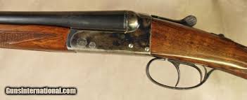 A blade front sight and notch rear sight with 3 white sight dots. Ugartechea Model 221 28 Gauge 26 Bbls