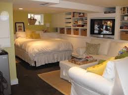 Most of the basement ceiling ideas here make use of relatively cheap materials like wood planks, paint, pvc and corrugated metals. Carlisle Classic Homes Remodeling Basements Seattle Wa Basement Master Bedroom Basement Guest Rooms Cheap Basement Ideas