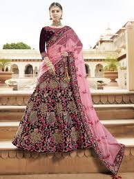 Velvet microfiber is mainly made from polyester fiber with micro denier and it has the plush quality of velvet but it is light in weight. Pure Micro Velvet Bridal Lehenga In Maroon With Zardosi Crystal Stone Work