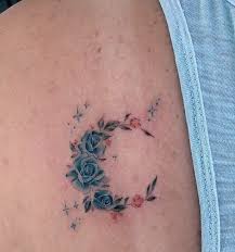 If you want a symbol of transition, creativity, and growth, then a moon tattoo is perfect for you. Grace Semi Hiatus On Twitter Sky S Aqua Roses Floral Crescent Moon Tattoo Https T Co 1inagdkxrk