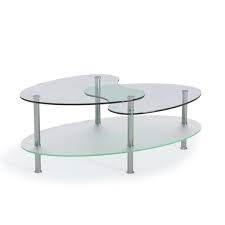 The lower tier of your coffee table isn't completely hidden, so if you're going to use it as a functional storage space, dress it up a little bit. Becca 38 Inch Oval Two Tier Glass Coffee Table