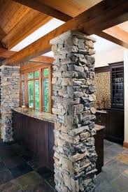 Quick, easy, and affordable fake stone wraps give every homeowner the ability to install stacked stone posts like a skilled craftsman. Top 50 Best Basement Pole Ideas Downstairs Column Cover Designs Basement Poles Basement Pole Stone Columns