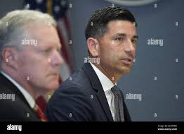 Chad Wolf, acting United States Secretary of Homeland Security, and Under  Secretary of Homeland Security for Strategy, Policy, and Plans (R), makes  his presentation during a briefing for US President Donald J.