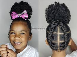 This allows her to elongate and stretch out her curls as much as possible, so once her braids have dried she's maximized her length and minimized shrinkage. Bun And Braids Toddler Style In 2020 Kids Hairstyles Toddler Hairstyles Girl Kids Braided Hairstyles