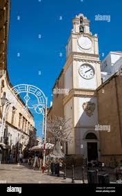 Clock tower of the Cathedral of Saint Agatha in Catania, Sicily, Italy  Stock Photo