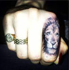 33 Majestic And Powerful Lion Tattoo Designs Hand Tattoos Finger Tattoos Cara Delevingne Tattoo