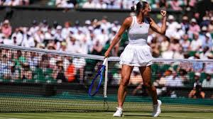 Marta Kostyuk celebrating her Wimbledon victory