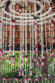 Use This Beautiful White And Purple Flowers Chandelier In Your Wedding Decor And Make The Indian Wedding Flowers Wedding Flower Decorations Flower Decorations