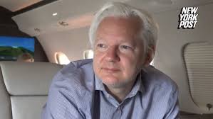 Julian Assange arrives in Bangkok before expecting to plead guilty in court
