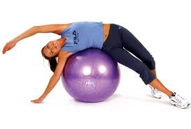 Tough Session At The Gym Stretch Your Obliques And Lower Back Muscles With This Easy Medicine Ball Exercise We Ball Exercises Medicine Ball Workout Exercise