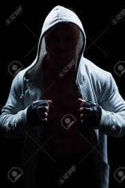 Gm532133862 $ 12.00 istock in stock Portrait Of Fighter With Hood And Gloves Against Black Background Stock Photo Picture And Royalty Free Image Image 45643392