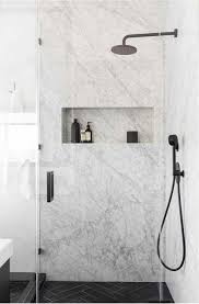 We are not saying that you should mute. Slab Marble Shower With Horizontal Niche And Black Fixtures Marble Showers Bathroom Design Bathroom Inspiration
