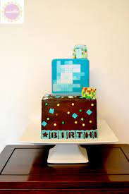 The fondant details are impressive. Elegant Minecraft Diamond Block Cake Cake By Miettes Cakesdecor