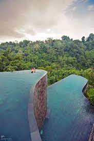 amazing infinity pool in bali couple beautiful destination click the picture to see the whole ph bali travel photography travel aesthetic infinity pool bali