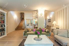 Large formal living room boasting a. Vintage Mansion A Spacious Classy Living Room In Beige Stock Photo Picture And Royalty Free Image Image 22343730