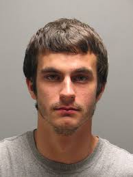 Warwick man arrested for firing 'warning shots' into couch, police say