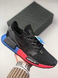 Many of you will know the adidas how about, for example, a completely black upper and a boost sole in red and blue? Adidas Nmd R1 V2 Black Blue Red For Sale Sneaker Hello
