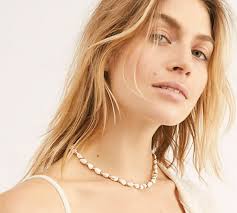 Collier coquillage Puka