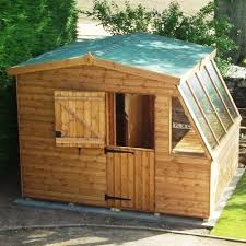 Small Glass Sided Area Serves As Greenhouse Potting Sheds Shed Design Greenhouse Shed Combo