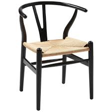 This timeless dining chair provides ultimate comfort and style at a modest price, pair with a dining table to complete the look today. Wishbone Chair Black Village Stores