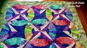 Designed to quilt one belly bar full (area between the takeup roller and the belly car) by 40. width of quilt. Wasatch Quilting
