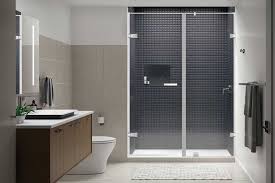 This contemporary styled bathroom with a bathtub and shower combo looks beautiful and evokes a look of complete elegance and beauty. 10 Unique Shower Enclosure Ideas To Choose For Super Luxury Home Feel