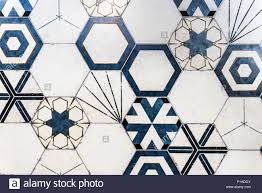 Hexagon tiles first gained popularity in the early 20th century, typically accompanied by subway wall tiles. Floor Tiles Texture Stock Photo Alamy