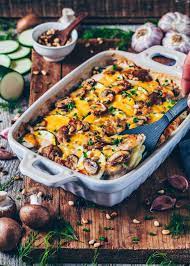 This Vegan Potato Bake Potatoes Au Gratin With Mushrooms And Zucchini Is Comfort Food At Its Best It S Creamy Potatoes Au Gratin Vegan Potato Potato Dishes