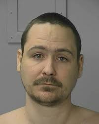 Brother of man who shot Kalamazoo police officer arraigned