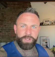 A man came under fire by online trolls for kissing his own son