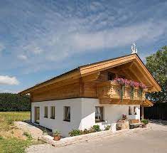 tiroler kombihaus riegel block hauskombination bauen haus altholz haus fassade haus