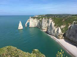 Etretat is a small coastal village on the alabaster coast in normandy. Worth Seeing Even In The Rain Review Of Falaises D Etretat Etretat France Tripadvisor
