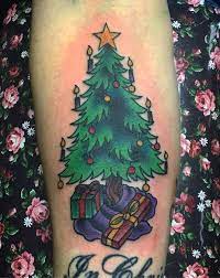 Great book of tattoo designs, revised edition: 45 Christmas Tattoos To Make Your Holiday More Memorable