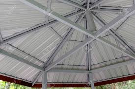 Storage room with cabin brown stain. Octagon Steel Frame Shelter With Metal Sheet Roof Leisure Pavilion Stock Photo Picture And Royalty Free Image Image 120260727