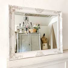 Redo your bathroom mirror with this diy bathroom mirror project. Beautifully Framed Bathroom Mirrors Hallstrom Home